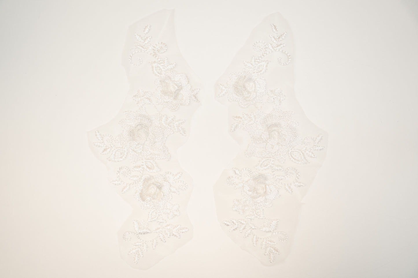 Textured white background with subtle patterns