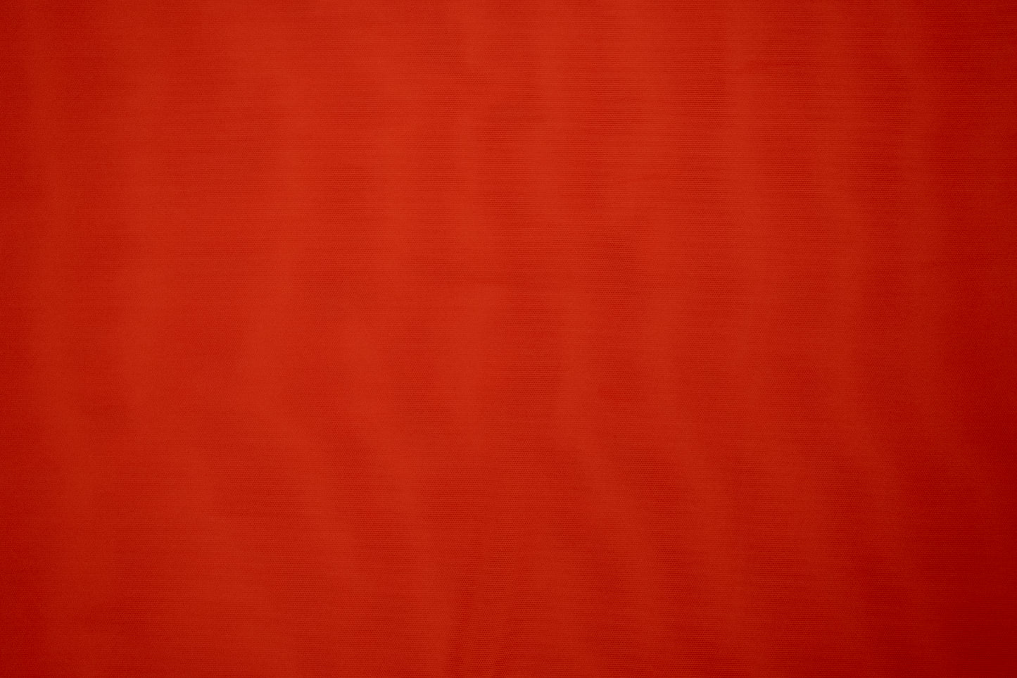 Solid red color swatch with a textured pattern