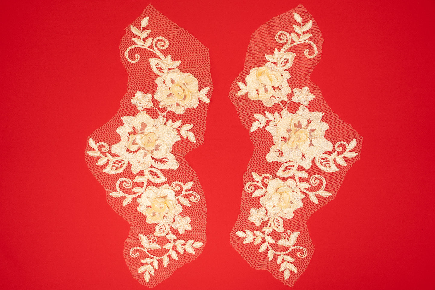 Decorative lace with floral patterns on a red background