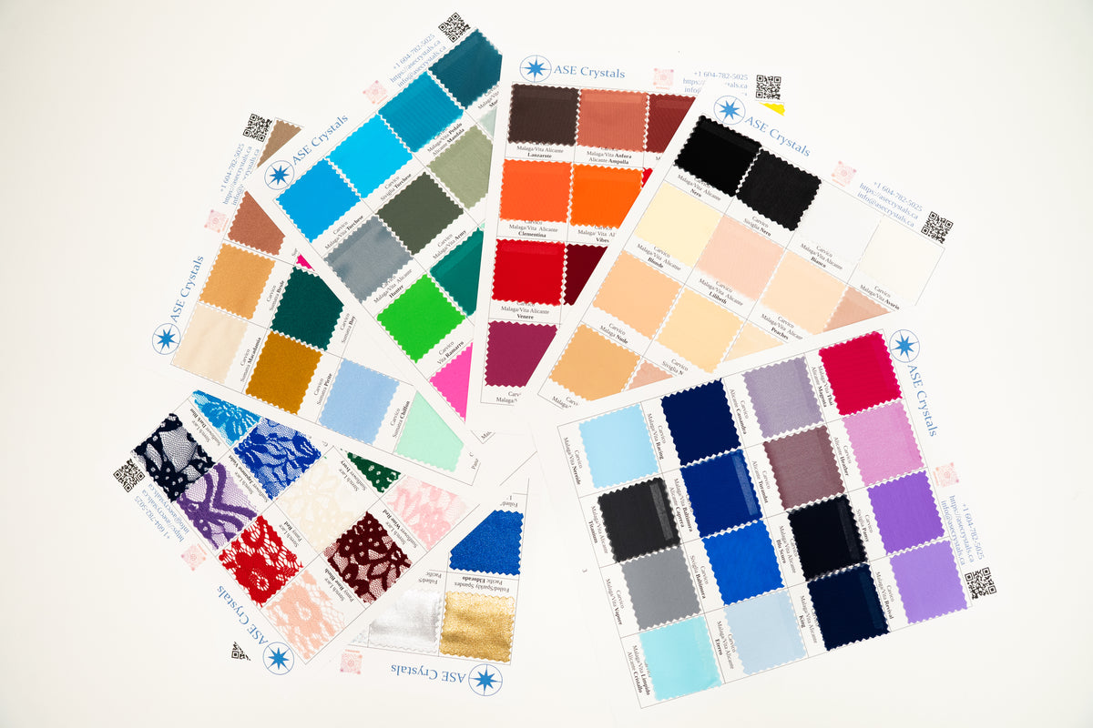 A fan arrangement of multiple fabric and color swatch cards on a plain white background, showing many color options and pattern swatches.