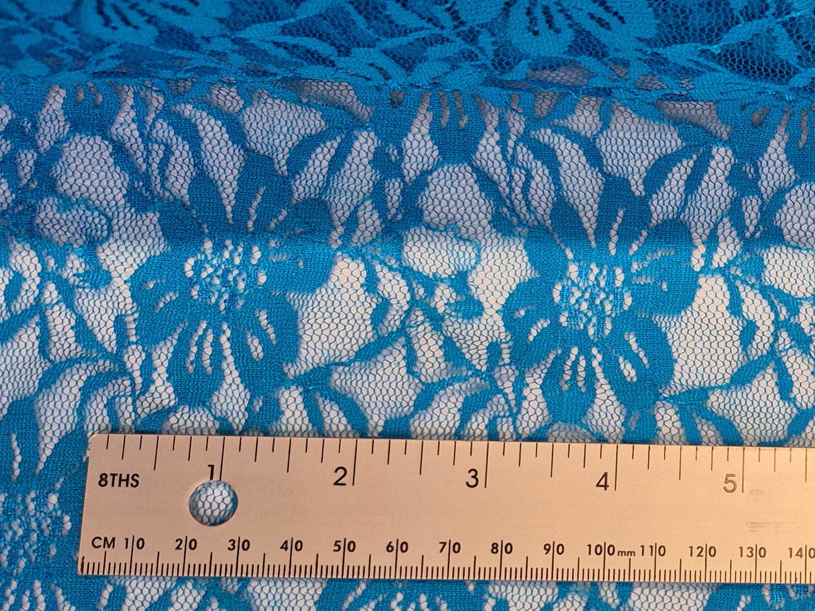 Stretch Lace Garden Flower Capri Blue $/foot