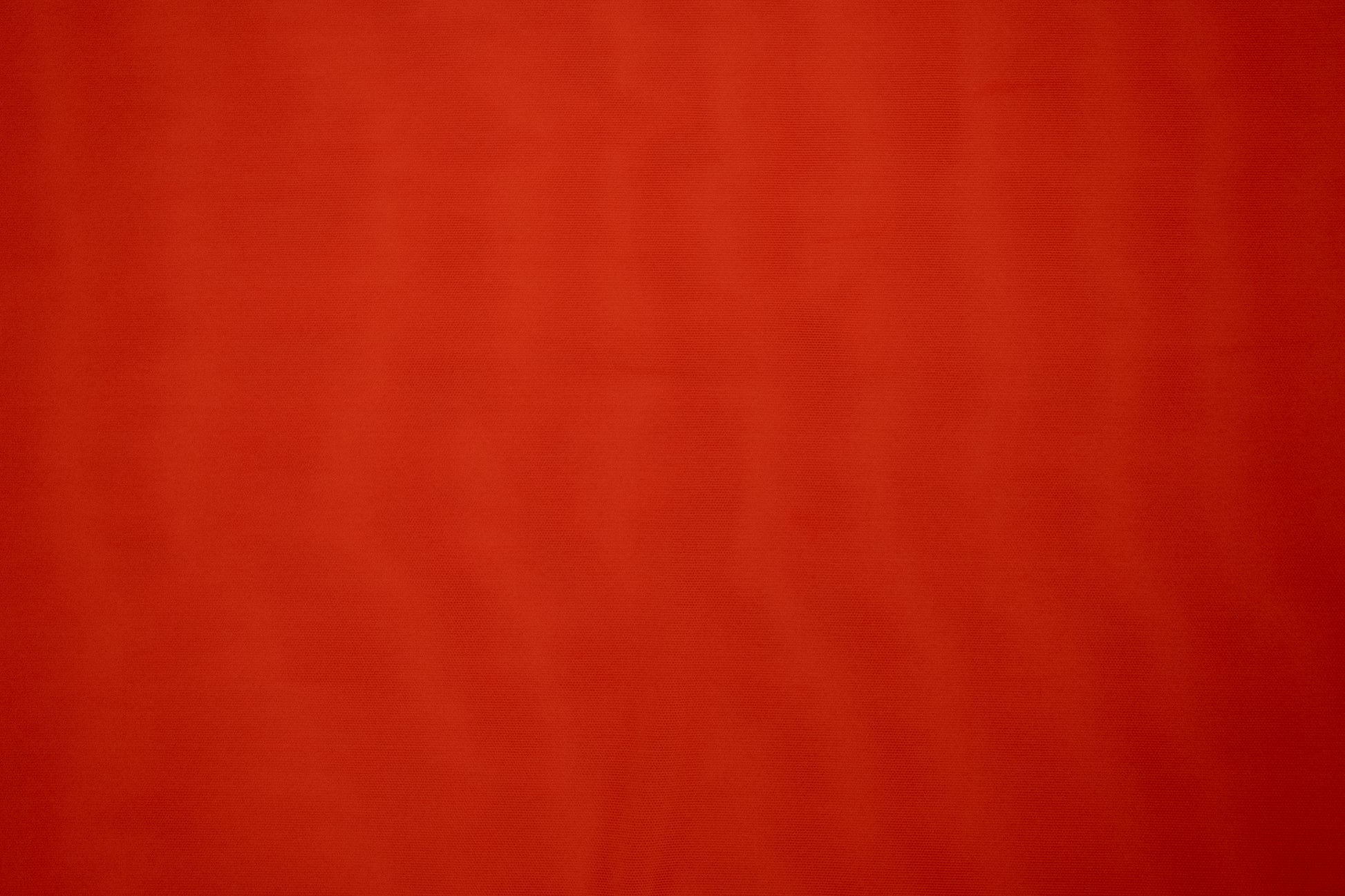 Solid red color swatch with a textured pattern