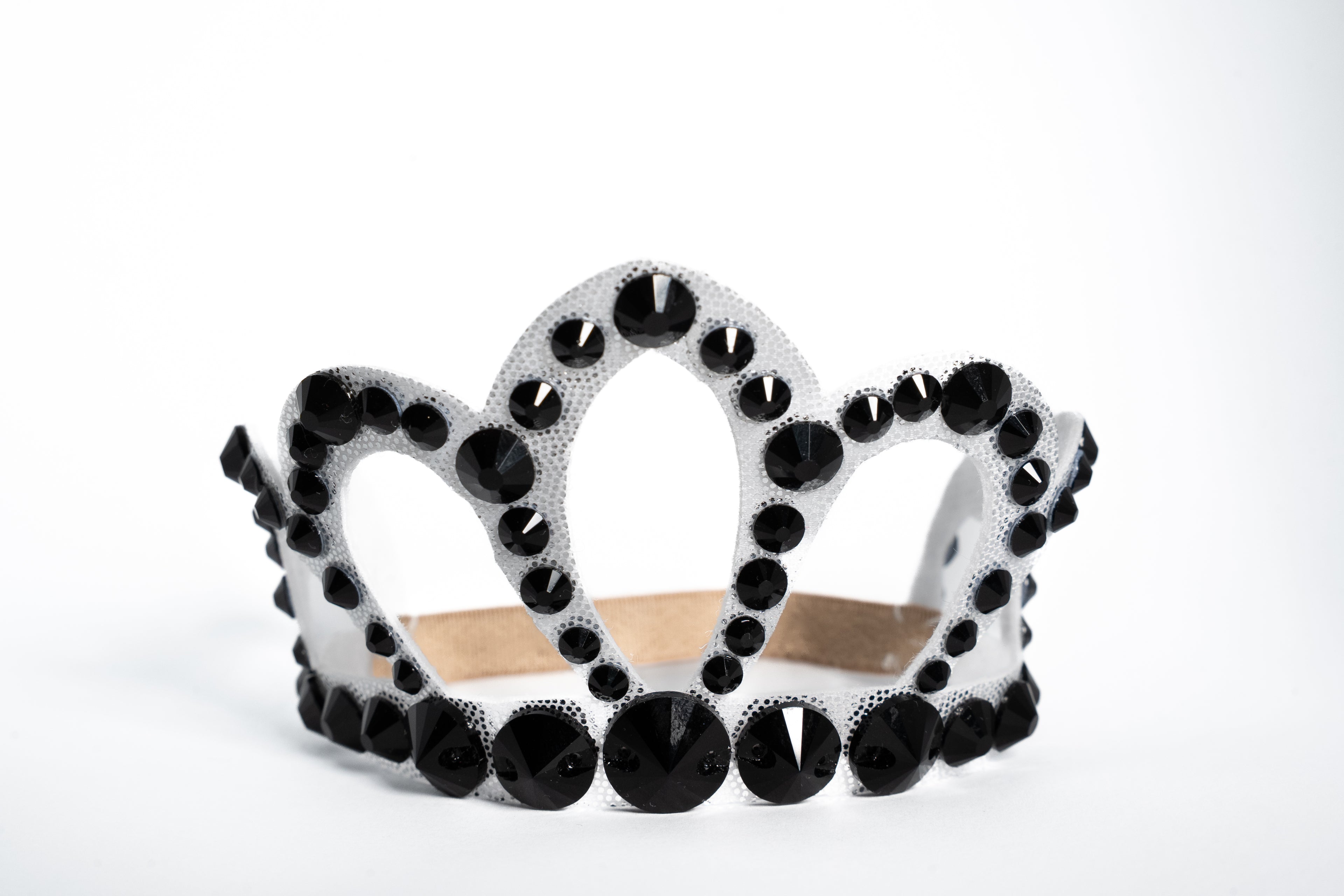 Black and white tiara with black rhinestones on a white background