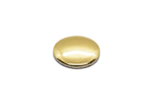 Gold circular object on a white background