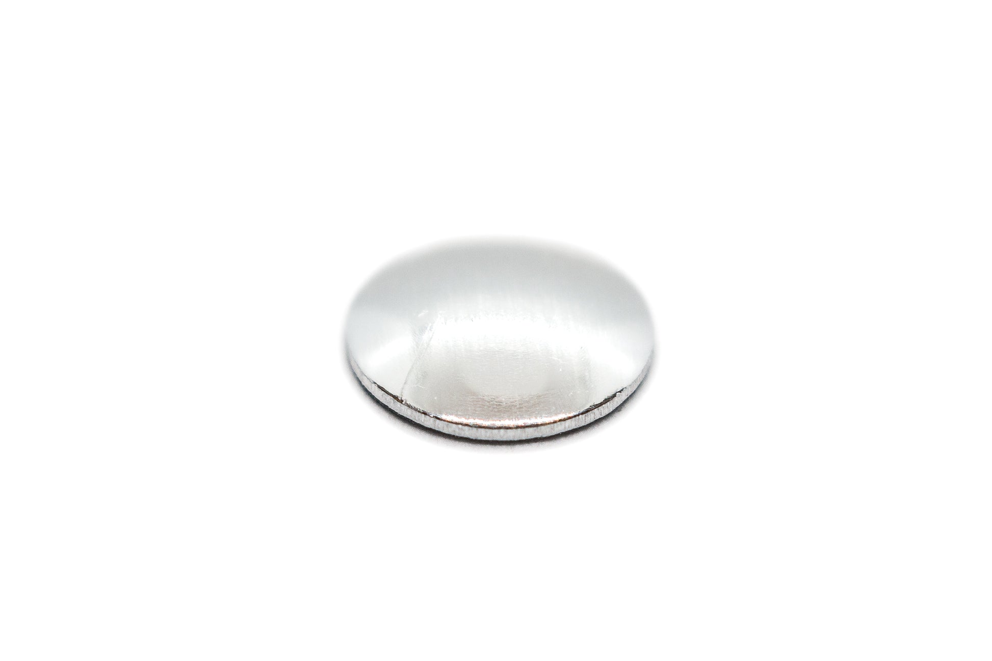Silver metallic object on a white background