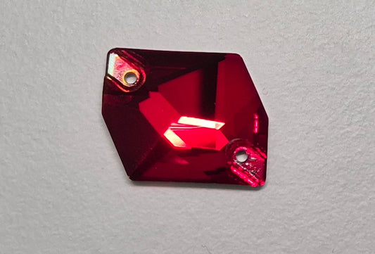Red gemstone on a gray background