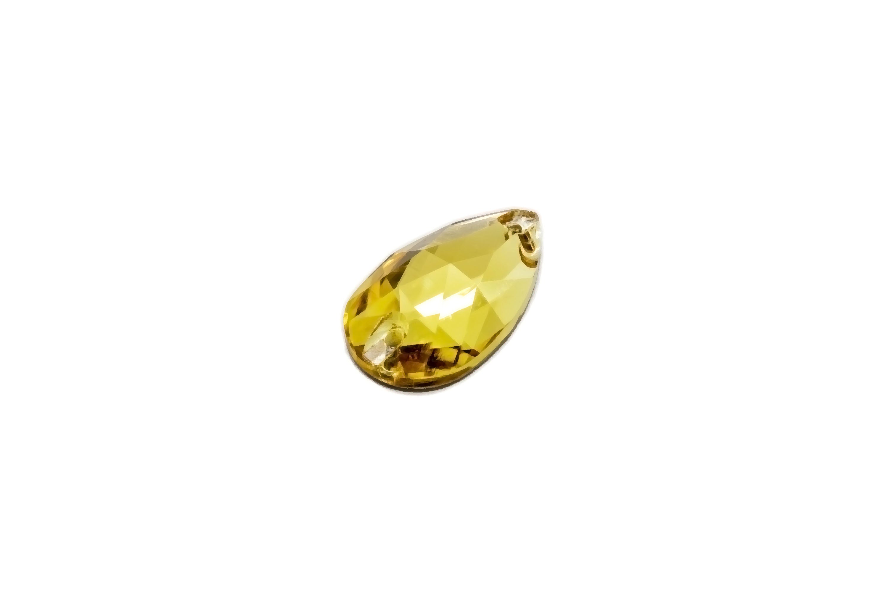 A single light topaz colored sew-on rhinestone with a tear-drop shape.